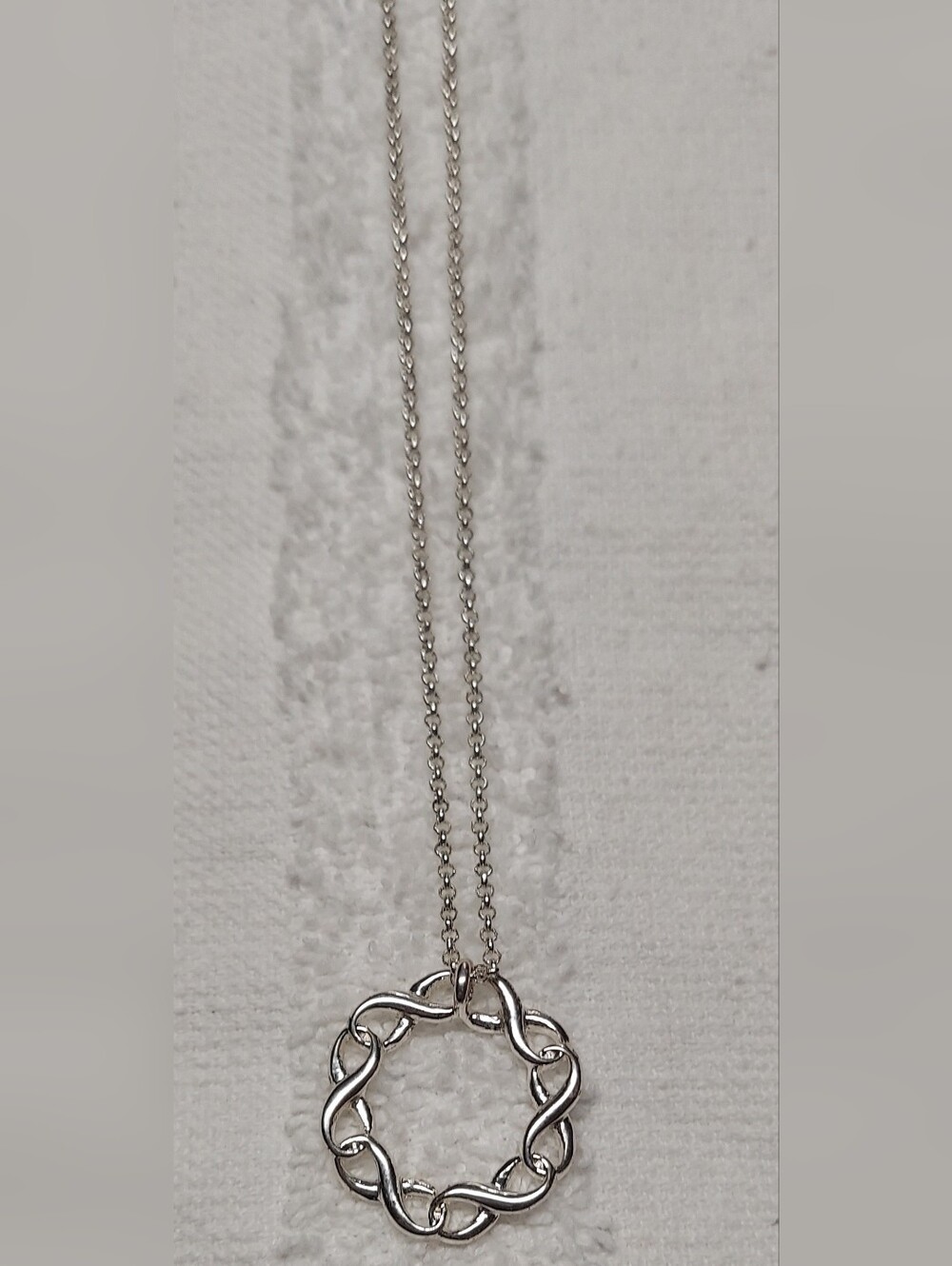 Avon Silvertone Infinity Wreath Necklace